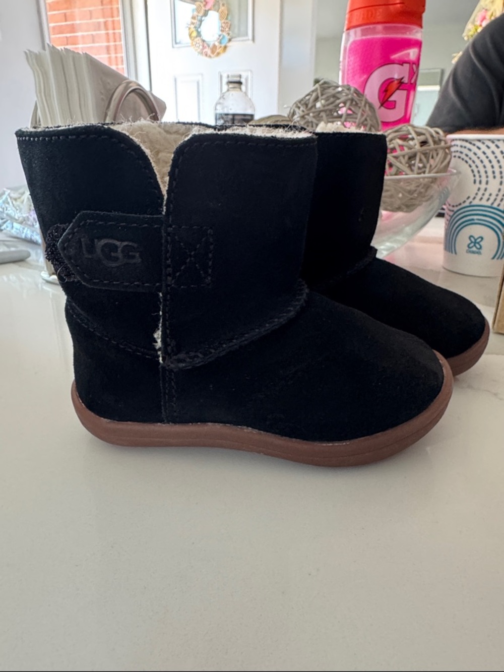 UGG Kids Black Suede Shearling Boot with Brown Sole